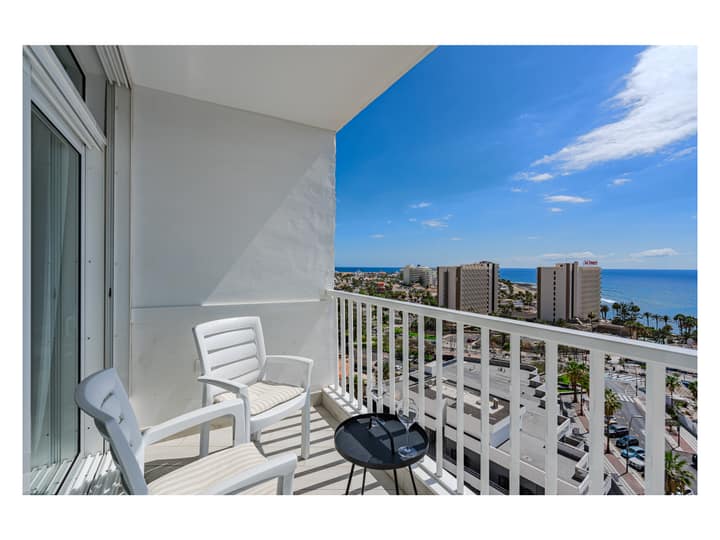 Balcony panorama over Las Américas and the ocean