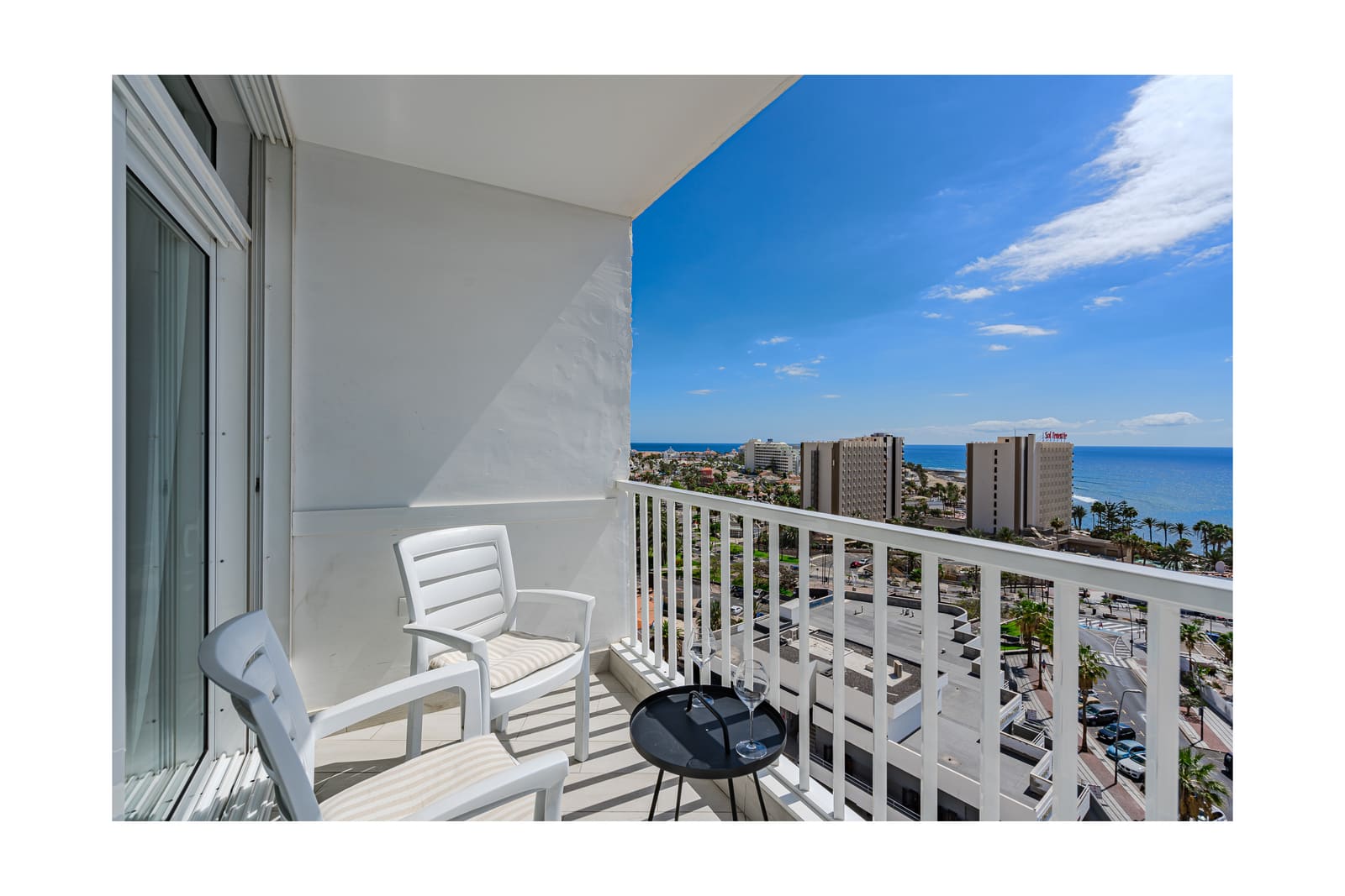 Balcony panorama over Las Américas and the ocean