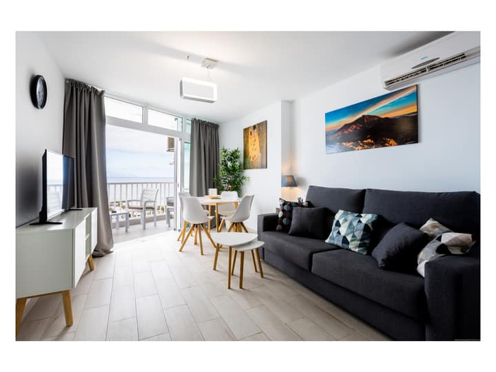 Bright living room with sofa bed