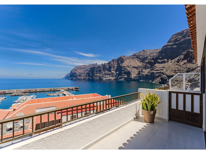 Terrace view of the Los Gigantes cliffs and marina